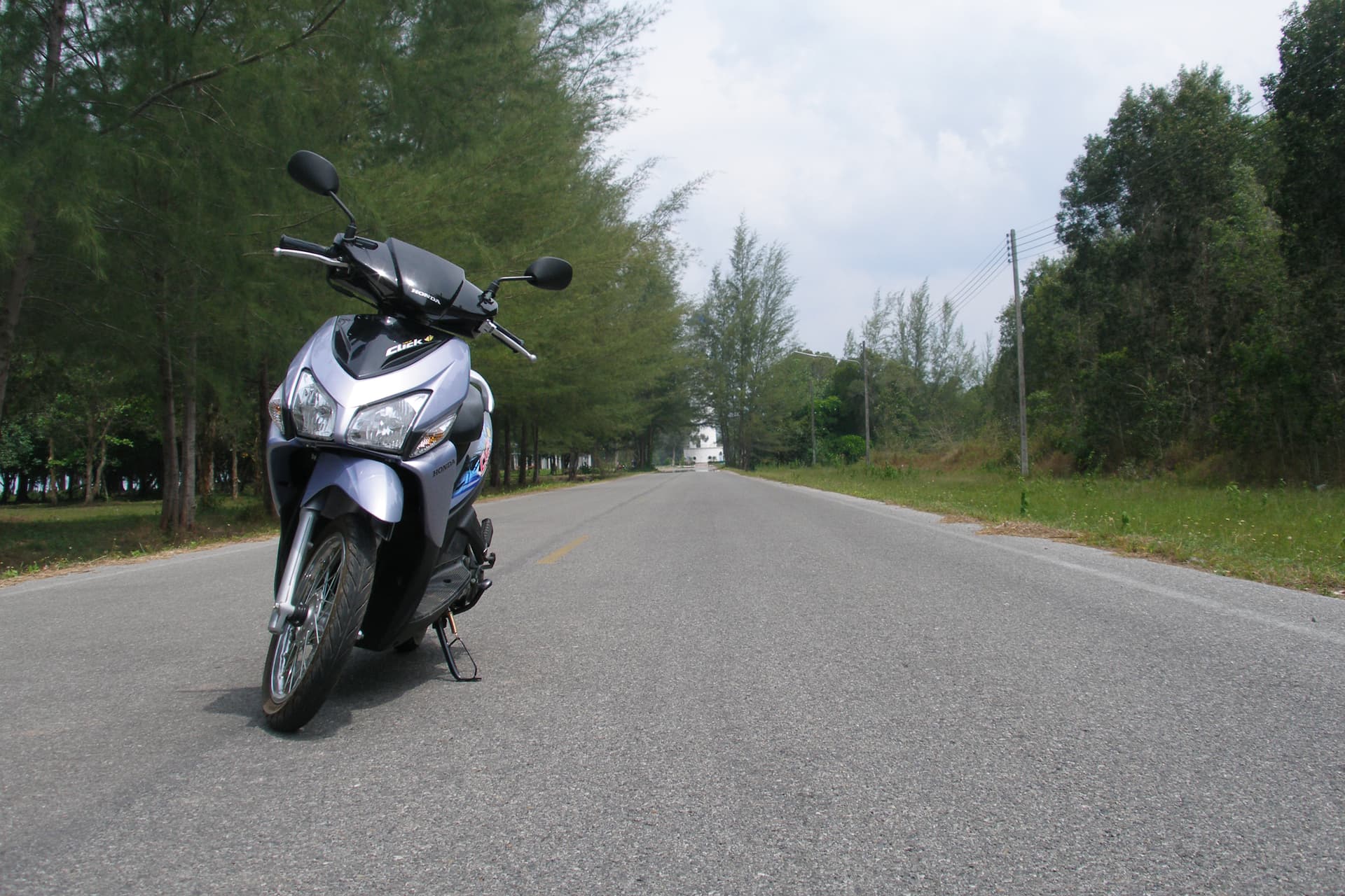 A Honda Click scooter parked in Thailand — the standard rental on Koh Phangan
